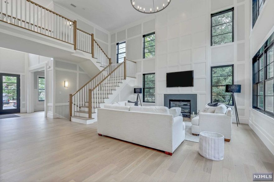 True luxury living in this NEW CONSTRUCTION! This show stopping 6 BR 6.5 BTH situated on Demarest's East Hill has A BREATHTAKING CURB APPEAL WITH ITS 120 FT LONG FRONT. Featuring a transitional style with beautiful accents and details and spanning over 7750 sq ft across the 3 levels. Features a bedroom and a full bathroom on the first floor, A MADE IN ITALY kitchen with Subzero and Thermador appliances, 3 sinks, a huge island, a butler's pantry and more. Each bedroom has its own bathroom. All bathroom's floors feature radiant heat and Porcelanosa tiles. Other amenities include a fire place in the family room and in the master suite, 10' ceiling on the first floor, smart features that are Wi-Fi compatible, a heated 3 car garage, a full house generator. Do not wait, secure this phenomenal house today.