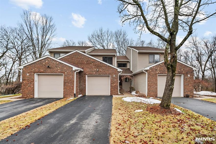 This spacious 3-bedroom, 2.5-bath townhouse in the Langdale Townhomes community offers a comfortable living space in a convenient Wayne location. The main level features a welcoming foyer, bright living room, dining area, and kitchen along with a convenient powder room. Upstairs, the primary suite includes its own private bath, while two additional bedrooms and a full bathroom provide plenty of space for everyone, guests, or a home office. The fully finished walk-out basement adds valuable additional living space ideal for a recreation room, media area, gym, or workspace. Additional highlights include central air, gas forced-air heat, an attached one-car garage with an additional parking space, and in-unit washer and dryer. The HOA covers exterior maintenance, common areas, and snow removal for low-maintenance living. Located close to parks, schools, shopping, and transportation, this home offers both comfort and convenience in a desirable Wayne community.