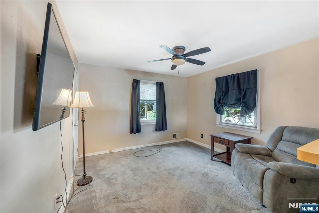 Photo of 69 River Road, New Milford, NJ 07646 (MLS # 25036089)