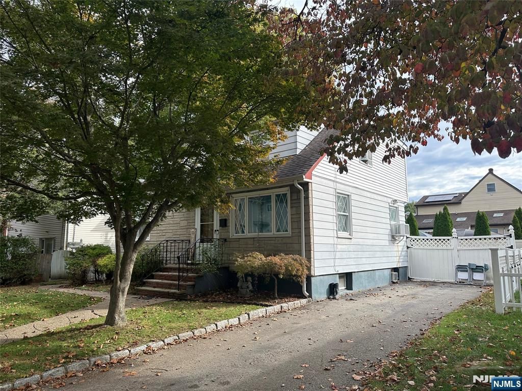 Photo of 69 River Road, New Milford, NJ 07646 (MLS # 25036089)