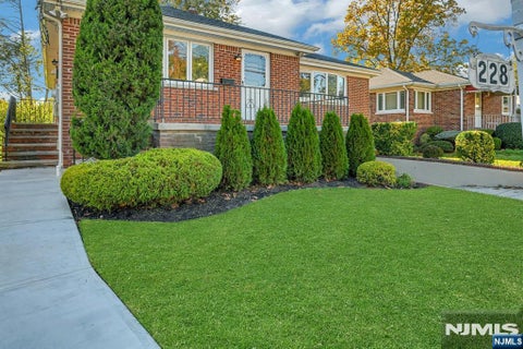 Photo of 228 Forest Road, Fort Lee, NJ 07024 (MLS # 26040348)