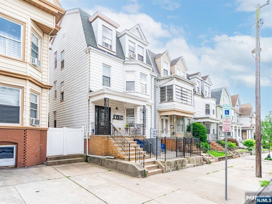 2 FAM WITH FINISHED ATTIC AND GROUND LEVEL W/ SEPARATE ENTRANCE. The caps were intentionally- this is THE house for you. Updated throughout, with four full bathrooms and forced hot air! Large rooms, separate utilities. Centrally located near NYC transit, Branch Brook Park and all THE GREAT CITY OF NEWARK has to offer! Come turn this house into a home before someone else does!