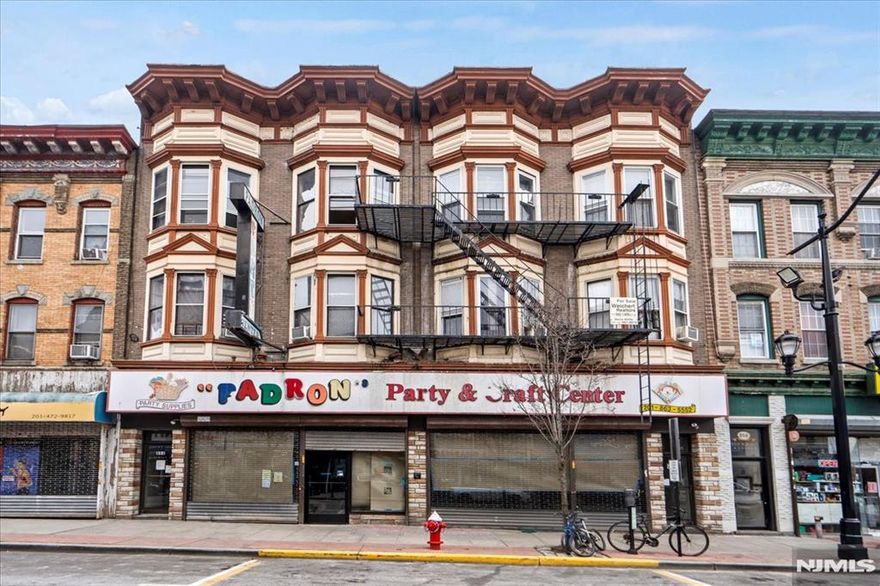 Commercial Mixed-Use. Prime Investment Opportunity in Union City, NJ, featuring 10 res units and 1 com space (approx. 4,200 SF) that can be used as 1 large store or 2 separate stores. Located in a highly desirable area w/ heavy foot traffic, the commercial space is fully equipped with 2 separate HVAC units (5 tons each), 2 electric panels, and 2 ADA bathrooms. The store also features new plumbing, electric, and HVAC, ensuring a modern and efficient setup. Currently under construction, it offers a unique opportunity for customization. The property includes a high-ceiling basement, providing additional storage or functional space. The res units have a new boiler, and common areas were renovated in 2025. 2025 total assessed value: $2,262,000. Opportunity to install telecom towers for additional income and prior discussions with an architect for adding 4-6 extra residential units make this an exceptional investment opportunity. Buyer to do their own due diligence.