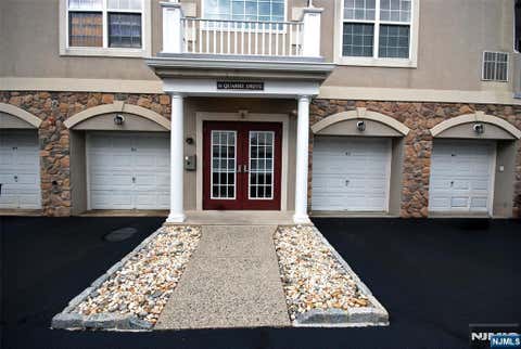 Photo of 6 Quarry Drive #A2, Woodland Park, NJ 07424 (MLS # 26031978)