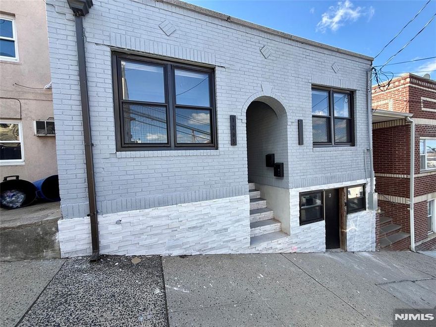 Call John 201-694-4971 Welcome home to this completely renovated sun drenched 4-bedroom, 2-bath residence featuring modern finishes and comfortable living throughout. Enjoy a bright and open layout with brand-new flooring, recessed lighting, smart glass entry door, motorized window shades and a stylish kitchen equipped with stainless-steel appliances, including a dishwasher. The home also offers central air conditioning and heat, an in-unit washer and dryer for your convenience, and spacious bedrooms with plenty of closet space. Enjoy the spacious backyard with plenty of room for BBQ's! Located on a quiet residential street near parks, schools, and transportation this home combines modern comfort with an ideal North Bergen location.