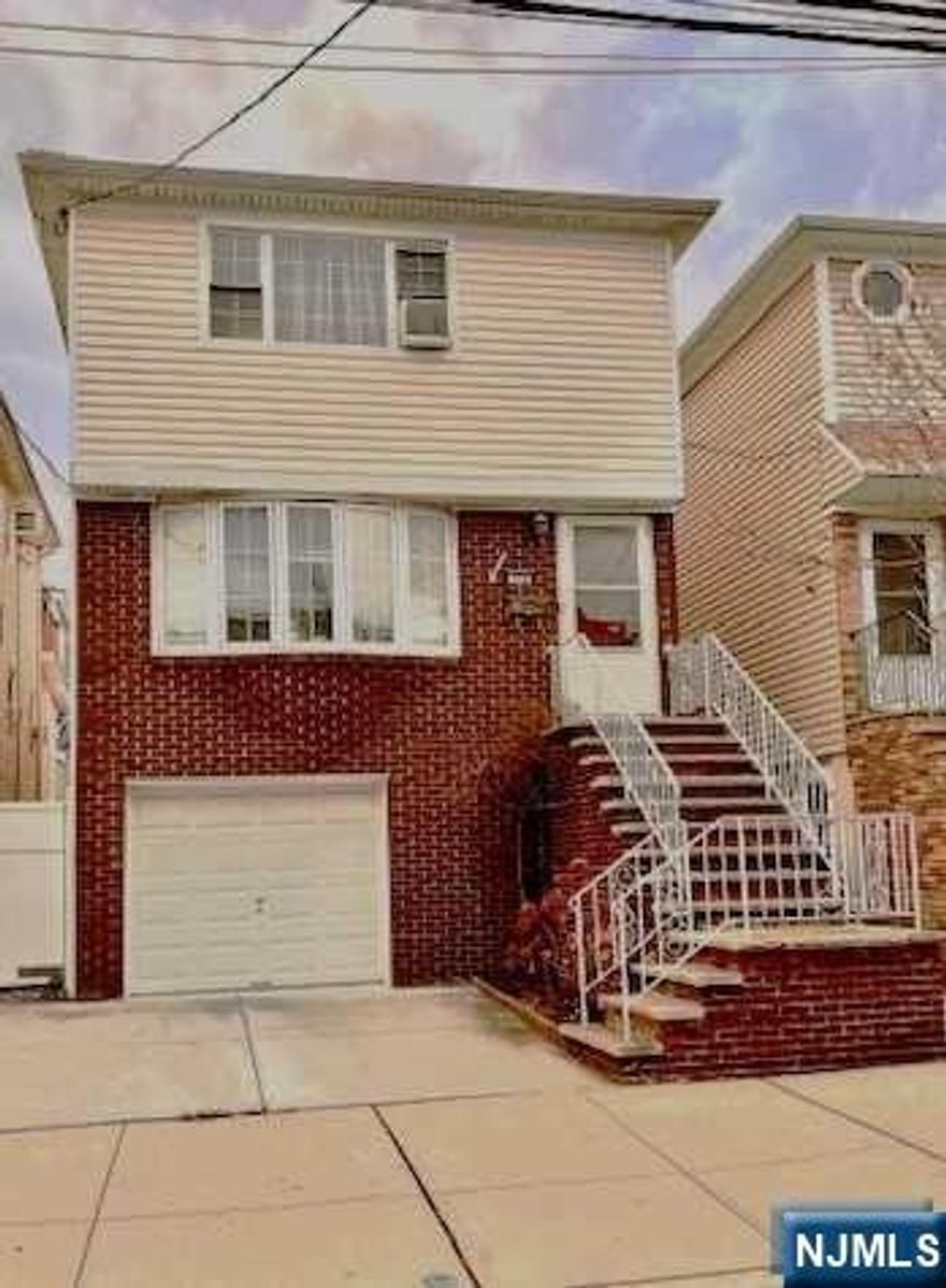 First fl unit consists of a combination of first and ground floors, offering 3 bedrooms, living and dining room, kitchen, 2 full updated bathrooms, play room, home office area, laundry room, furnace room and garage access. The second floor offers 2 bedrooms, very large living room, kitchen and one bathroom.This 2 family property offers hardwood floors throughout and has been well kept by owner's occupied with many updates done over the last 20 years which includes the roof, siding, replaced walls of living and dining rooms first floor and added insulation, all windows but ground floor ones, driveway with replaced cement floor plus garage added flooring and garage door and fully replaced stairs of main entrance of house plus storm door, completely renovated 2 full bathrooms of first floor unit. A great property built in the 1960's. Close to shopping, Schools, Entertaiment, Public Transportation, Public Park for adults and children, Restaurants, Main St with a diverse Restaurants.