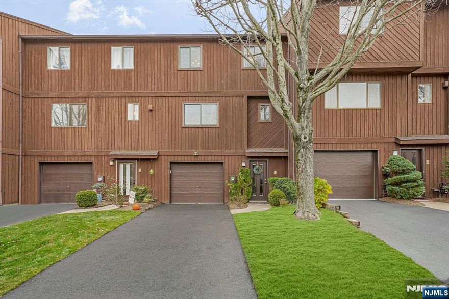 Welcome to this stunning 4-bedroom, 3.5-bath townhome located in the highly sought after Highview at Hawthorne community. This lovely townhome offers 3 levels of living. Upon entering the unit on the ground floor you will find the foyer, a full bath and a bedroom. One car garage is attached to the unit. On the second level you will find a beautiful, spacious and bright living, dining room area with a fireplace, sliders to the deck with stunning views of the NY city skyline. The kitchen and a half bath complete the 2nd level. On the third floor you will find the primary bedroom suite with a full bath, an additional 2 bedrooms, a full bath and the laundry. The community is pet friendly and conveniently located near major highways, train transportation, shopping, and local parks, providing easy access for commuters and daily amenities. A rare opportunity to own a larger townhome in a well kept, centrally located complex.