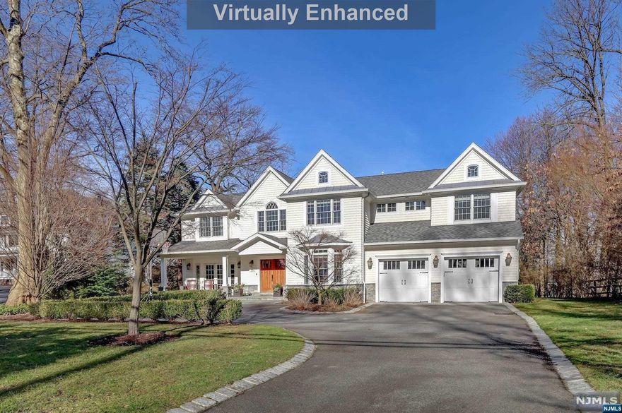 This 10 yrs stone & cedar shake manor sits on a beautifully landscaped 3/4-acre lot offers over 7500 sq ft of living space. Large courtyard, 3-car garage & covered bluestone porch. The grand two-story entrance leads to the formal living room & dining room with a coffered ceiling. The great room with double height ceiling & fireplace opens onto the back bluestone patio. The spacious chef's kitchen has high-end appliances, large island, breakfast room, butler's pantry &mudroom. 2nd floor consists of a luxurious master suite custom walk-in closet & spa-like bathroom, 3 more en-suite bedrooms & huge family room. Finished basement has a 6th bedroom, full bath, recreation with home theater & gym. Outdoor offers bluestone patio, huge private yard green yard with room for a pool. Walking to schools & NYC bus