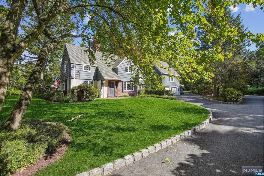 Welcome home to this exquisite 5-bedroom, 4.5-bath residence. Upon entry, you'll be greeted by delightful features like rich walnut trim and built ins. The formal LR/DR establish the grandeur of this magnificent estate. Open kitchen, with central island, hardwood floors, and ss appliances, is complemented by a pantry. A great room bathed in natural light seamlessly connects to a bar area and an exceptionally spacious mudroom, designed with organization in mind. Ascend one of 3 staircases to discover a total of 5 bedrooms along with 4 meticulous bathrooms (2 en-suite). The primary suite is a sanctuary of its own, featuring a private balcony, an expansive closet, and loft space. This home effortlessly balances functionality with entertainment. Charming pergola, fire pit and sport court nestled in the sprawling level yard create the epitome of recreational enjoyment. This home is the perfect blend of elegance, comfort and entertainment, promising a truly exceptional living experience