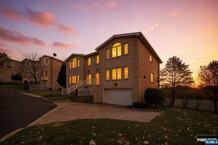 Supremely elegant 3BR/3.1BA townhome with incredible sunset and Palisades views! Located moments from shopping, dining, parks, and NYC transportation, this home features an open layout with gleaming hardwood floors, crown molding, abundant natural light, and a cozy fireplace living room. The chefâ€™s eat-in kitchen offers stainless-steel appliances, granite counters, gas stove, pantry/closet, and an adjoining formal dining room. The upper level includes a spacious primary suite with two closets and private bath, plus two additional bedrooms and a full hallway bathroom. The finished lower level adds a family room, full bathroom, storage, and flexible space for guests, office, or gym. Additional highlights include a 2-car garage, ample driveway parking, main-level powder room, laundry closet (W/D), and low-maintenance living. Enjoy elegant comfort, stunning views, and exceptional convenienceâ€”a refined Ridgefield living experience close to NYC.