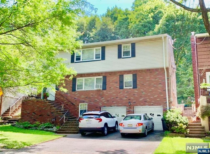 TWO FAMILY --- NEW KITCHENS, RENOVATED BATHROOMS, NEW FLOORING ON THE GROUND LEVEL, PAINTED TWO YEARS AGO, 2 LARGE ATTACHED GARAGES, LARGE BACK YARD, GOOD LOCATION, ONE GAS FURNACE, ONE HOT WATER HEATER, SEPARATE GAS METTER AND ELECTRIC METER, NO WATER ISSUES.