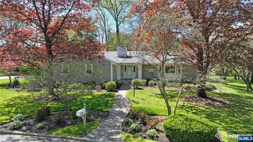 Pristine, renovated Ranch set on half acre in beautiful, quiet neighborhood in desirable Woodcliff Lake. Great curb appeal with lush landscaping and impressive stacked stone columned entry welcomes you into this picture prefect one-floor living home. Open floor plan with expansive sun filled living room, custom white, granite and stainless chefâ€™s kitchen with center island-perfect for gatherings -which flows into the dining room and the warm inviting Family room with corner gas fireplace. Generous bedrooms including a king -size primary bedroom suite with luxurious bathroom & renovated second full bathroom & powder room. Additional features include the first floor laundry room, sprawling deck overlooking serene yard, two car garage, sprinkler system, large basement rec room, large storage. 2018 upgrades include new roof, siding, windows, hardwood flooring & crown moldings. Conveniently located to NY transportation, top rated schools & recreational park lands.