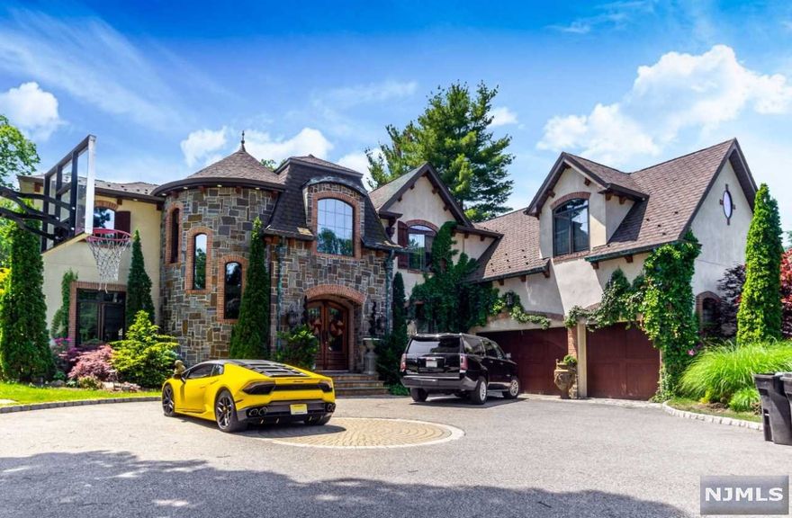 Welcome to this enchanting fusion of striking, traditional elegance and chic, modern vision. From the moment of arrival, a balance between grandiose architectural elements and thoughtful, understated details sets the tone for this unparalleled beautiful property. On the main level, the foyer leads to dining and living area w/fireplace. The home's spectacular kitchen is a statement piece unto itself with views out onto the backyard's lush greenery. Additionally, you will also find, wine cellar, office, family room and powder room. Second floor offers master suite with master bath and walk in closet, four additional bedrooms and two full bathrooms. Full finished basement. The magical backyard will transform you into feeling like you are on an exotic island, greenery integrating multiple relaxing areas overlooking in-ground pool and expansive pool house. This home is one of a kind come and see for yourself.