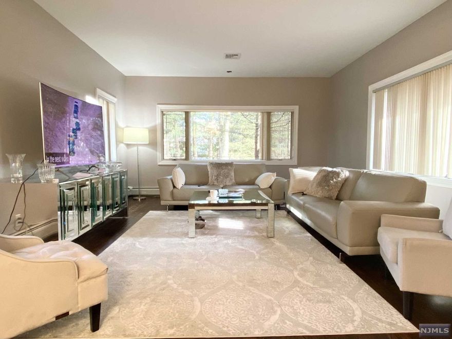 Huge lot, 0.615 FLAT Acre! Possibility of subdivision(Buyers must do their own due diligence). Updated 4 Br/3 full Bth ranch house w/ fully finished lower level & large private backyard with an in-ground pool(pool sold as is). Tree lined & set far back from the main road. The ground floor offers a EF, open layout LR / DR, kitchen w/ skylight, a bonus room, Main Br suite w/ full bath, 2 Additional bedrooms & a hallway full bath, an expansive deck. Hardwood floor as installed. The lower level offers a BRIGHT spacious Family Rm w/ a fireplace, a recreation room and a wet-bar, 1 large Bm & full Bth, laundry, walk-out to the backyard. Attached 2 car garage with wrap around driveway to Merritt Ave., plenty of parking spaces, etc. Close to downtown, house of worship, schools, shopping, transportation to NYC.