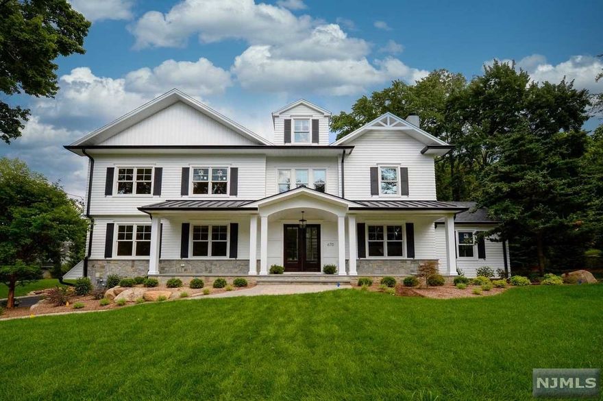 MAGNIFICENT CUSTOM BUILT NEW CONSTRUCTION 5 BEDROOM, 4.5 BATH, 3 CAR GARAGE CENTER HALL COLONIAL SITUATED ON 2/3 OF AN ACRE OF PROPERTY IN THE MOST DEISRABLE SECTION OF SICOMAC. INVITING FRONT PORCH OPENS TO 2 STORY ENTRY, FORMAL LIVING ROOM/CONVERSATION ROOM, BANQUET STYLE FORMAL DINING ROOM (17'5"x 26'), BUTLER'S PANTRY W CUSTOM WINE WALL, GOURMET KITCHEN W 10' ISLAND, 48" WOLF RANGE, 36" DACOR FREEZER & 36"FRIDGE, WALK IN PANTRY, OPENS TO GREAT RM W FPL & BUILT-IN COCKTAIL BAR, CHARMING OFFICE/LIBRARY W WOODBURN FPL, PR, & GUEST ENSUITE BEDROOM. 2ND FL FEATURES BR, BR, FBA, ENSUITE BR, MASTER SUITE W MASTER BATH, & LAUNDRY. 3RD FL OFFERS THE PERFECT FUTURE GETAWAY BONUS ROOM. FULL FINISHED LOWER LEVEL FOR REC RM, OFFICE, & ACCESS TO 3 CAR GAR. RADIANT IN ALL FULL BATHS. 4" OAK FLOORING THRU-OUT. DETAIL THRU-OUT. 11 ZONE IRRIGATION. FULLY SODDED PROPERTY. COVERED REAR PATIO. PERFECTION. 5200 SQ FT - 1ST & 2ND FL.