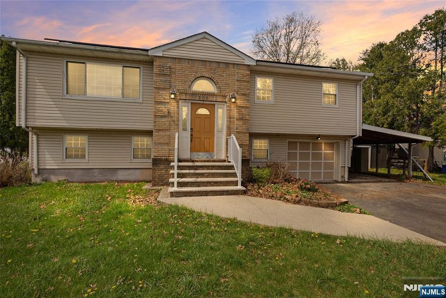 Step into this spacious bi-level home offering a total of 5 bedrooms and 2 full baths, thoughtfully designed for comfortable living and effortless entertaining. The upper level welcomes you with a bright entry foyer featuring a half-moon window, leading into an open-concept living/dining combo. The living area is accented by a sleek wall-mounted electric LED fireplace, while the adjoining dining space flows seamlessly into the updated maple kitchen, complete with eggshell Corian countertops, a mini subway tile backsplash, and a convenient breakfast bar. Three generously sized bedrooms and a full bath complete this level. The lower level provides additional versatility with a second full kitchen and cozy breakfast nook, perfect for extended living or hosting. This space opens directly to a covered patio and swimming pool, creating a great setting for outdoor enjoyment. Two additional bedrooms, including a spacious primary bedroom with sliding glass doors to the patio, a full bath, and an oversized laundry room round out this level. With ample space and a flexible layout, this home offers a perfect blend of comfort and functionality.