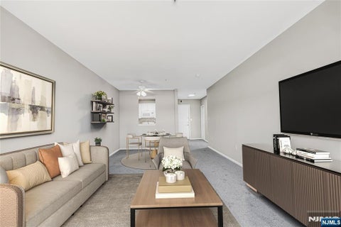 Photo of 905 River Rd #312, Edgewater, NJ 07020 (MLS # 26037937)