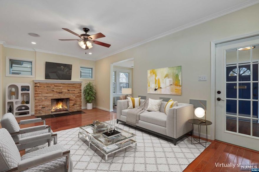 Gorgeous! Enjoy the serene setting of living the suburbia lifestyle in this beautifully remodeled Colonial. It's the perfect marriage of character and charm with today's modern luxuries. You'll fall in love with this corner property! It invites comfort, exudes style, personality and the space will EXCEED your expectations. A 4 bedroom, 1.5 bath beloved gem. Starting with the private yard, two car detached garage and continuing inside, enjoy endless entertaining possibilities. Plenty of natural flowing light throughout the airy layout with TWO bonus first level flex rooms. Entry foyer, living room, attractive fireplace, dining room and gorgeous kitchen with breakfast nook. Second level primary bedroom, 2 additional bedrooms, full bath and 3rd level bedroom. Separate side entry, basement finished flex room, laundry, utility & storage. Convenient location near, shops, schools and seamless NYC commute...this is an exceptional opportunity not to be missed!