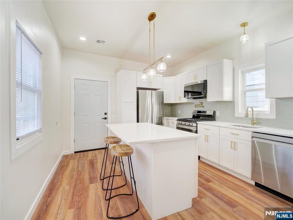 Photo of 50 Hillyer Street, Orange, NJ 07050 (MLS # 26000750)