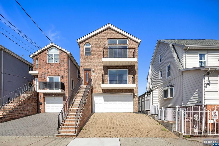 Modern 2-family gem in North Bergen, built in 2005. Gleaming with natural light, each identical unit features an expansive floor plan including 3 spacious bedrooms, 2 full baths, laundry & abundant storage. This home is fully updated with brand new bathrooms, new LVP flooring, a finished lower level, rear paver patio & driveway, and large 2-car garage with additional storage. Enjoy peace of mind with owned solar-powered generator and newer mechanical components. Just moments from the Hudson River waterfront and easy NYC transit access. Ideal for city commuters seeking comfort & convenience in a fantastic neighborhood. Don't miss out!