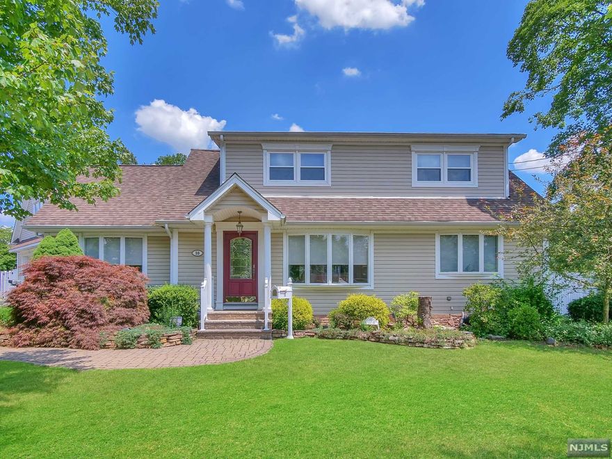 Well maintained expanded Cape Cod Style home offering 4 bedrooms and 2 full bathrooms! First floor offers living room with bay window and family room with stone fireplace. Kitchen offers granite countertops, SS appliances, plenty of cabinet storage & separate dining area. Sliding glass doors lead to screened in porch overlooking the backyard oasis! Master bedroom w/ large walk-in closet & full bathroom complete the 1st floor. Retreat upstairs to find 2 sizable bedrooms & full bath. 3rd floor features large additional bedroom w/ vaulted ceilings. Enjoy complete privacy in your backyard, which is an entertainer's dream! From the in-ground pool to the firepit & cabana w/ wet-bar & shower, your guests will never want to leave! Large grass area is also a great feature in the backyard. Oversized 2-car garage.