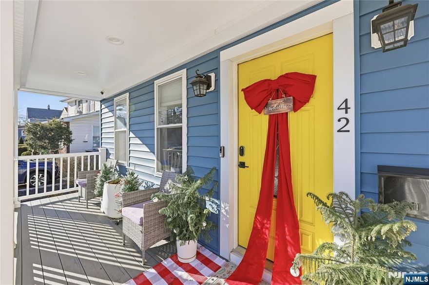 This beautiful home in Bergenfield, was renovated several years ago and it has been meticulously maintain. It welcomes you with a balcony. Enter into Living room which leads to dinning area with sliding doors to a covered patio. First floor has a full bathroom and a modern kitchen. Second floor has two bedroom and full bathroom. It also has spiral stairs the lead to a fully finished attic used as a spare bedroom or family room. Basement is fully finished - area for family room, laundry room, walking storage closet and access to yard.