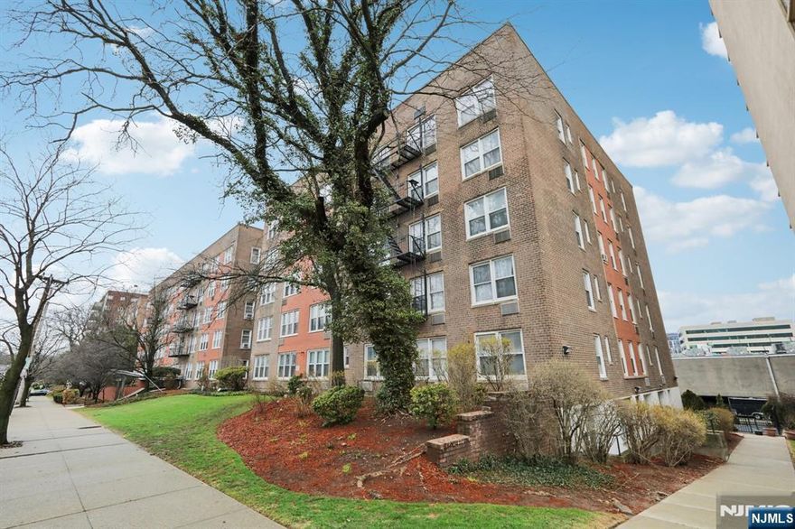 Beautifully updated 2-bedroom, 2-bath home offering generous space, modern finishes, and effortless comfort. The residence features a large open living and dining area with rich hardwood floors and oversized windows that fill the space with natural light. The renovated kitchen is thoughtfully designed with crisp white cabinetry, sleek countertops, stainless steel appliances, and contemporary black accents. Both bedrooms offer comfortable proportions and great functionality, including a spacious primary suite with its own private bath. With updated interiors and a convenient location near shopping, dining, and transportation, this is an excellent opportunity for move-in ready living.