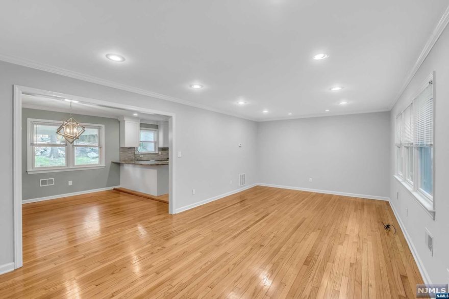 Completely renovated house in year 2016 from inside and out in the very desirable area in Ramsey. New Plumbing, Electric, High efficiency HVAC, Water Heater, Anderson 400 Windows, Doors, Roof and Gutter. The first floor features open floor plan kitchen with dining room and formal living room, two spacious bedrooms and full bath. Enjoy the beautiful modern kitchen with breakfast bar, glass backsplash, granite countertop, recessed lighting, under cabinet lighting, undermount sink and stainless steel appliances. The second floor offers three expansive bedrooms, full bath and bonus room. All bedrooms comes with ample brand new customized built-in California closets. Hardwood floor throughout. Basement is full, unfinished with washer/dryer, utility area and storage space. Walking distance to NYC train, school, shopping center, Finch Park and the center town. Owner holds NJRE license.