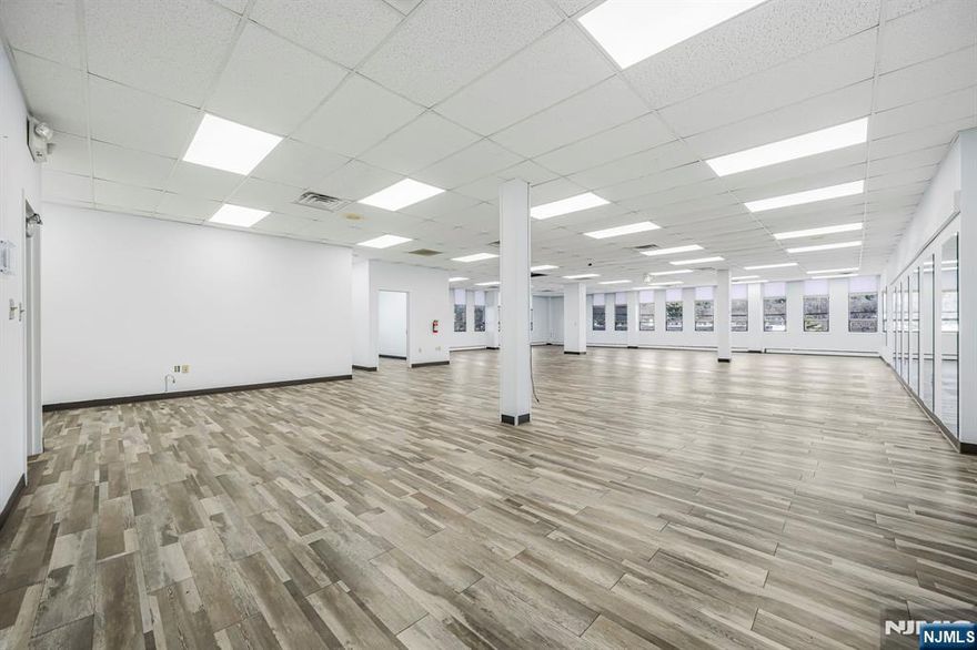 3,525 sqft second-floor corner suite-ideal for a Pilates, fitness/wellness studio or a professional office with open collaborative space. Features two private offices, a private restroom, and a large open floorplan filled with natural light. Part of One Lethbridge Plaza, a fully refreshed professional complex with modern amenities, easy navigation, and a layout that supports diverse business needs and smooth operations. Convenient access to Route 17, Route 287, and the NYS Thruway, offering visibility and accessibility for clients and staff. Modified gross lease. $6903/mo + CAM ($650/mo). Utilities included in base rent. 3+ yr term. Direct signage on Rt. 17 N!