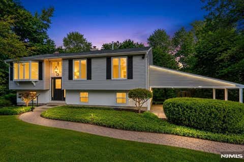 Photo of 13 Chickadee Road, Mount Olive Township, NJ 07828 (MLS # 26023641)