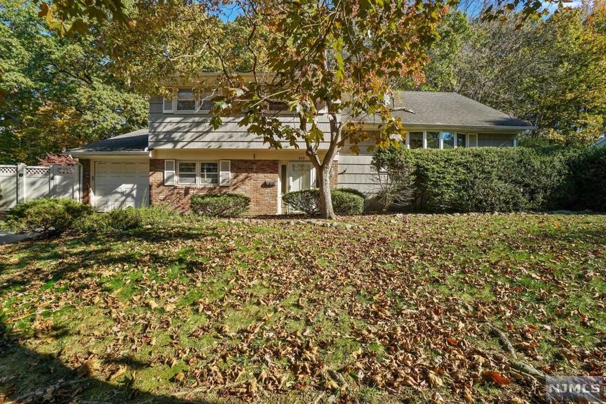 Fantastic opportunity, this Sugar Maple Split features 4 bedrooms and 2 full baths on 110 x 200 property.Lower level features family room, bedroom, full bath and access to basement with laundry and utilities. Main Floor offers Living Room, eat in Kitchen and dining room with sliding glass door to deck. Upstairs 3 bedrooms and full bath and walk up attic. Great home for entertaining, Backyard complete with patio, deck and One side of property an In-ground pool. Convenient to highways and transportation, shopping. Call today!