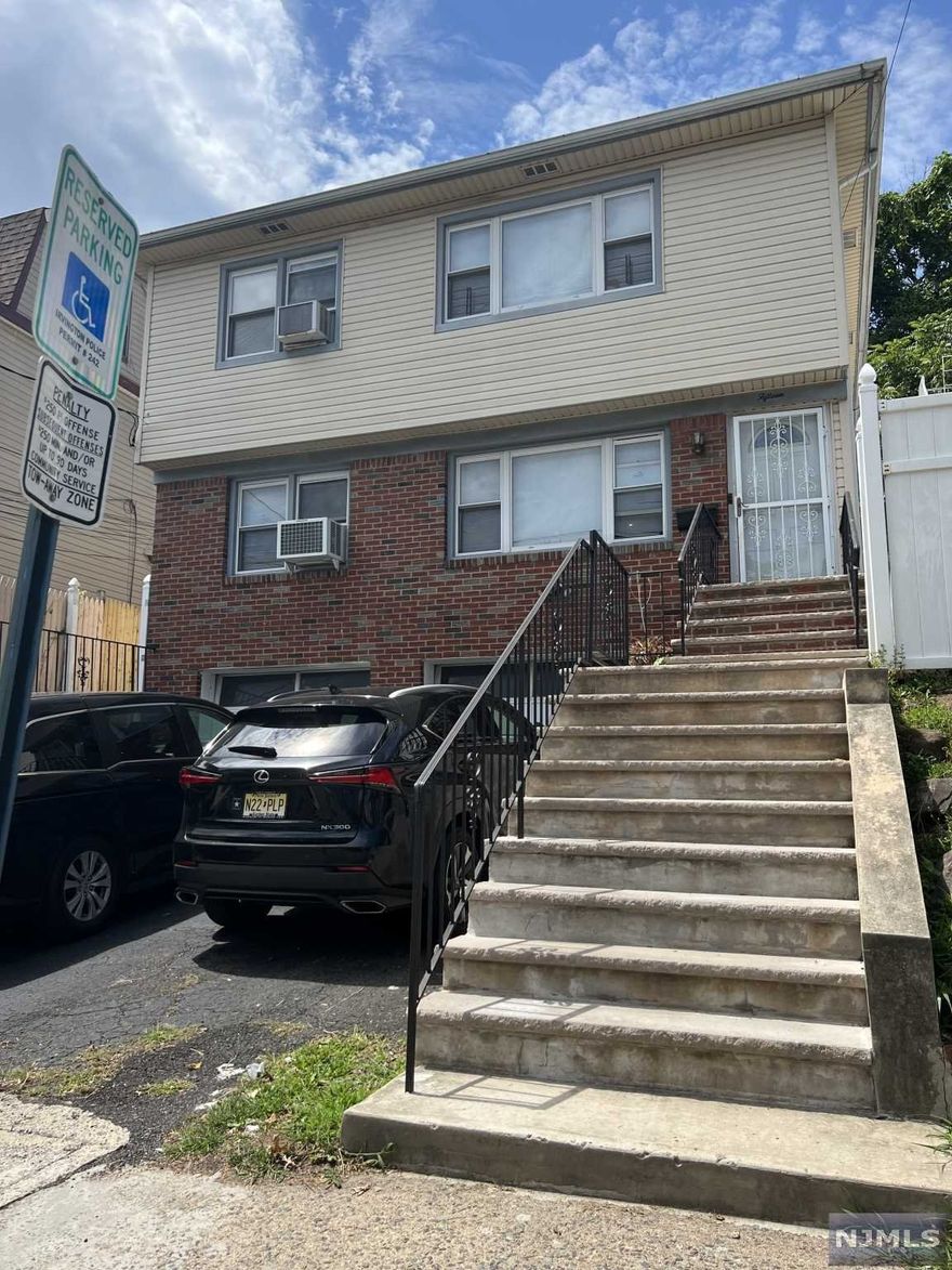 VERY NICE 2 FAMILY HOME 3/3 WITH FINISHED BASEMENT. TONS OF STORAGE ..PARKING AND QUIET ST..GREAT INVESTMENT.