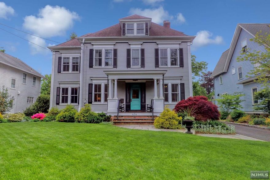 A seamless blend of turn of the century charm and 21st century sophistication, this is the home you've been yearning for. Stunning architectural details, high ceilings, exquisite craftsmanship paired with a meticulous design sensibility. Featuring beautifully updated kitchen and baths, four 2nd floor bedrooms that include a primary suite with a walk in closet and gorgeous primary bath. A third floor bedroom with bath, perfect for guests or home office. Newly refinished basement with playroom, gym,laundry & half bath. Back porch and patio overlook lushly landscaped private yard. Two car detached garage. Unsurpassed attention to detail make this turn key home a true standout. Located in the sought after Somerville neighborhood convenient to schools and strolling distance to Ridgewood's vibrant downtown. Ridgewood is known for its excellent school system, award winning library, exceptional recreational facilities and proximity to NYC. This one is sure to spark joy. Don't hesitate.