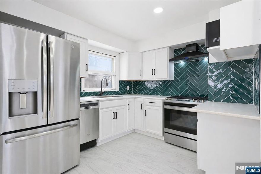 Welcome to Clifton! This renovated 3 Bed/2 Full Bath property offers a versatile layout across multiple levels, providing comfortable living and excellent functionality. The home features an open concept living and dining areas filled with natural light. The kitchen is perfect for entertaining w/ SS appliances and ample cabinet space. Off the dining room is a screened-in porch/den for additional living space and access to the private backyard. The bedrooms are spacious with large closets. The partially finished basement can be an additional living room, rec room, playroom, etc, the possibilities are endless! Central A/C and forced hot air. Separate laundry room w/ W/D hook-up. 1 car attached garage and private driveway. Ideally located near major highways and access to NJ Transit bus lines and nearby train stations (Clifton and Delawanna) for easy commuting to NYC. Donâ€™t miss the chance to own in one of the most desirable towns - book your showing today!