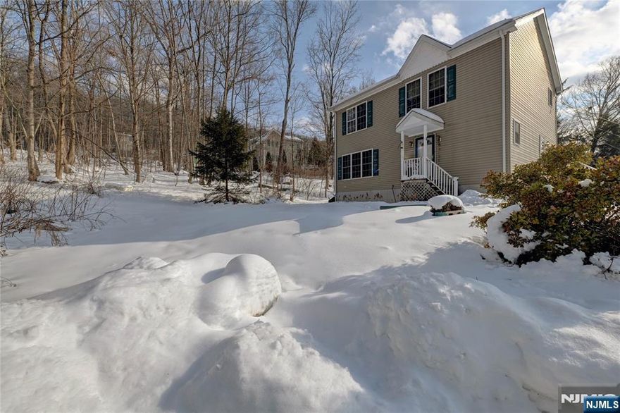 Wonderful 3 bedroom, 2.5 bath Colonial in the Cozy Lake section of Oak Ridge in Jefferson Township. Nice and private. This house is situated at the end of a dead end street surrounded by a wooded area. This modular home was built in 2007 and features a nice size kitchen and separate breakfast nook. Plenty of cabinets and counterspace and stainless steel appliances. Sliders from kitchen lead to a wood deck. There is also a large living room and a large formal dining room. A half bath completes the first floor. Upstairs has 3 nice size bedrooms and 2 full baths. Attic with pull down stairs. Great location. Close to major highways, transportation, and shopping. Don't miss this one!. You won't be disappointed.