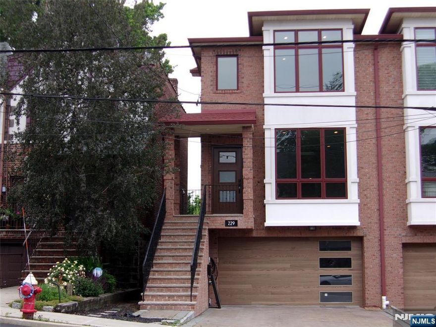 Beautifully updated condition, 3bed rooms, 4 bathrooms (2/2), built in 2018 in the prime area of town, High ceiling & hard wood floor throughout, sky light hallway, front facing south, fireplace living room, new dish washer, ss kitchen appliances including wine cooler, large kitchen island/breakfast bar, spacious family room leading to deck, master bathroom with shower stall, separately enclosed toilet room & jacuzzi tub, 3 closets in master bedroom, finished high ceiling basement has sliding door to back patio, new washer/dryer, EV charger outside wall next to garage, #4 elementary school, tree lined street, a few steps away from the park, near to GW bridge, east access to major high way and many more.