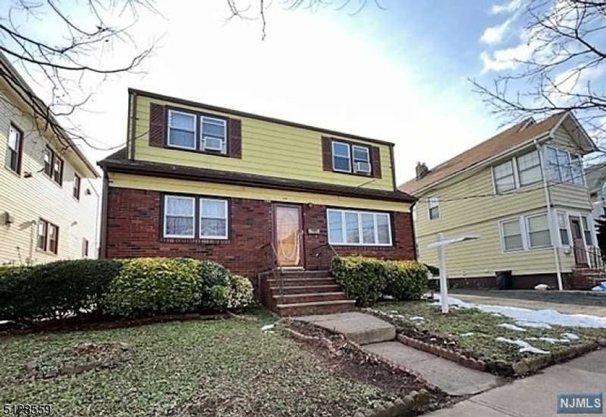 Updated two family spacious through out. First floor offering hardwood floors, spacious eat in kitchen, three large bedrooms with nice sized closets. Handicap accessible elevator to ground level and backyard use. Second floor consist of living room, two bedrooms, eat in kitchen. Huge finished basement with endless options of use. Home has central air in both units. Detached spacious garage, nice sized backyard ready for entertainment.