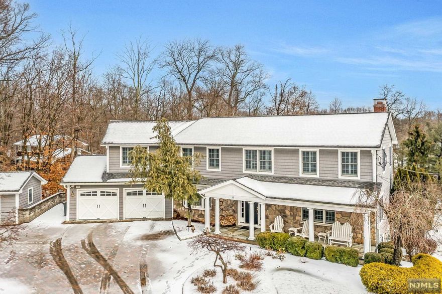 Every once in a while you find a home that checks all the boxes. Location, neighborhood, and the house. This is the one! This custom renovation is by no means cookie cutter. Offering space, scale, and function with quality at the highest level. This home is for entertaining inside and out with an open floor plan and large family room with custom built-ins. The backyard offers multiple decks and patios with an inground gunite pool with gorgeous and mature landscaping. The master suite offers a stunning bathroom, walk in closet, sauna, and sitting room ideal for a home office. A charming sunroom offers views of the entire property and great for lounging out on a Sunday morning with a cup of coffee. Lower level is finished with a 5th bedroom and full bath with a kitchen and outside entrance; ideal for extended family or out of town guests. Enjoy the lower level family room with working fireplace. This home and neighborhood is a true show stopper.