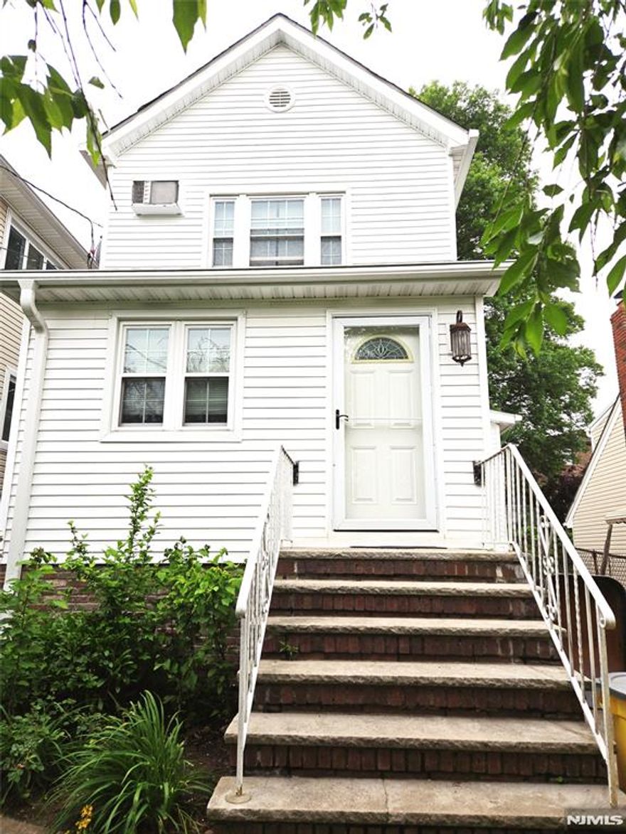 GREAT LOCATION ON QUIET STREET. VERY CLOSE TO NYC BUS, SHOPPING, AND SCHOOLS. WELL UPDATED: FINISHED BASEMENT, FINISHED ATTIC, NEWER BOILER, AND SHED. STREET PARKING.