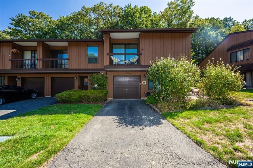 Step into this beautifully updated, multi-level townhome, perfectly designed for modern living. Featuring 2 spacious bedrooms and 2 full baths, with a fully finished basement, this home offers plenty of room to relax, entertain, and make memories. Enjoy your morning coffee on the private back porch or take in the views from the balcony off the primary bedroom. The home is filled with thoughtful upgrades, including gorgeous hardwood floors, high-hat lighting throughout, and cathedral ceilings that create a bright, open atmosphere. Cozy up by the wood-burning fireplace on cool evenings or take advantage of the newer HVAC system for year-round comfort. With so many useful updates throughout, this home truly offers everything you need. Nothing left to do but unpack and settle in!