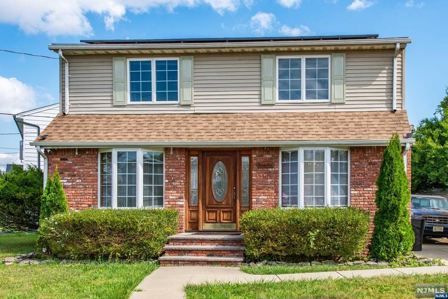 Custom home on fenced-in corner lot! Updated and ready to move in. Hardwood floors throughout. Updated kitchen with white cabinetry, corian countertops & is great space for cooking. Formal DR w/ crown molding, recessed lighting is great size for large or small gatherings. Big FR w/crown molding is a great place to relax. Big windows allow lots of natural light to flow into the house. Master bedroom has walk in closet. 2 other bedrooms are generous in size w/ ample closet space. French doors in kitchen open to brick patio that overlooks the property. So many updates including newer roof, C/A, vinyl siding, furnace and so much more! Close to Rts 3, 17, 80, shopping and restaurants. 10 miles to NYC!