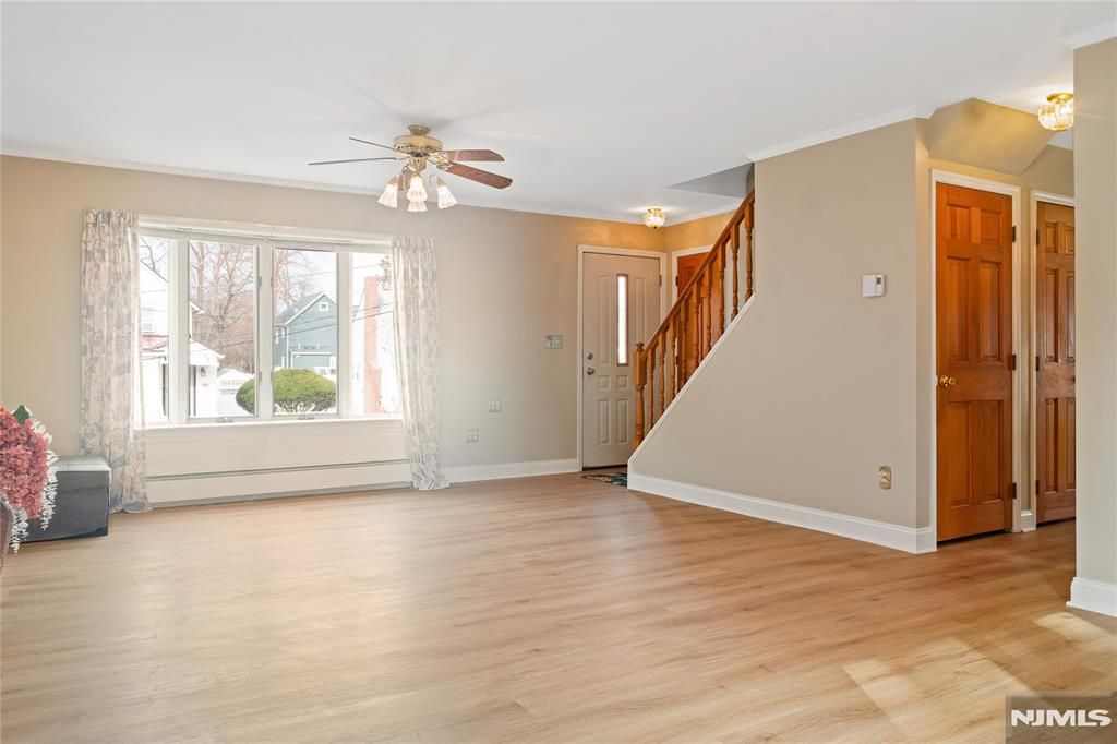 Photo of 121 Pine Avenue, New Milford, NJ 07646 (MLS # 26009143)