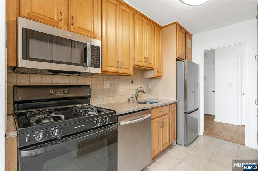 Bright, southeast facing corner 2 bedroom unit with a separate dining room is now available for rent. Hardwood parquet floors throughout. Galley kitchen with new refrigerator and newer cabinets. Renovated bathrooms. Plenty of closet space. Rent does NOT include personal electric, parking ($75/month per car)is assigned by management at time of move in or cable ( choice of Spectrum or Verizon Fios). Med South offers 24 hr doorman/security, on site management and maintenance offices. Pool membership is free for all unit residents. Gym $15/month per resident over 14 years old. Outdoor pool, tennis, basketball and pickle ball courts. Easy commute to NYC with NJ Transit bus stops nearby and NJ highways with convenient access. Columbia employees have a free shuttle available across the street. Fort Lee offers many restaurant options, parks and religious houses to partake in. Come take a look !