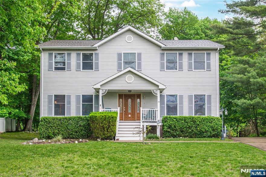 Welcome to this charming 4-bedroom, 2.5-bath center hall Colonial in the heart of Oakland, NJ. Situated on a quiet street, this spacious home features a classic layout with a formal dining room, cozy living room with gas fireplace, and an inviting family room seamlessly connected to the kitchenâ€”perfect for everyday living and entertaining. The bright eat-in kitchen opens to a large deck through sliding glass doors, offering easy indoor-outdoor flow. Upstairs, youâ€™ll find four generously sized bedrooms, including a large primary suite with a walk-in closet and private full bath. The fully finished basement provides ample space for a home office, recreation, or gym, plus additional storage. With a functional layout and desirable location, this home is ready to offer comfort, convenience and style. Donâ€™t miss the opportunity to make this beautiful property your own!