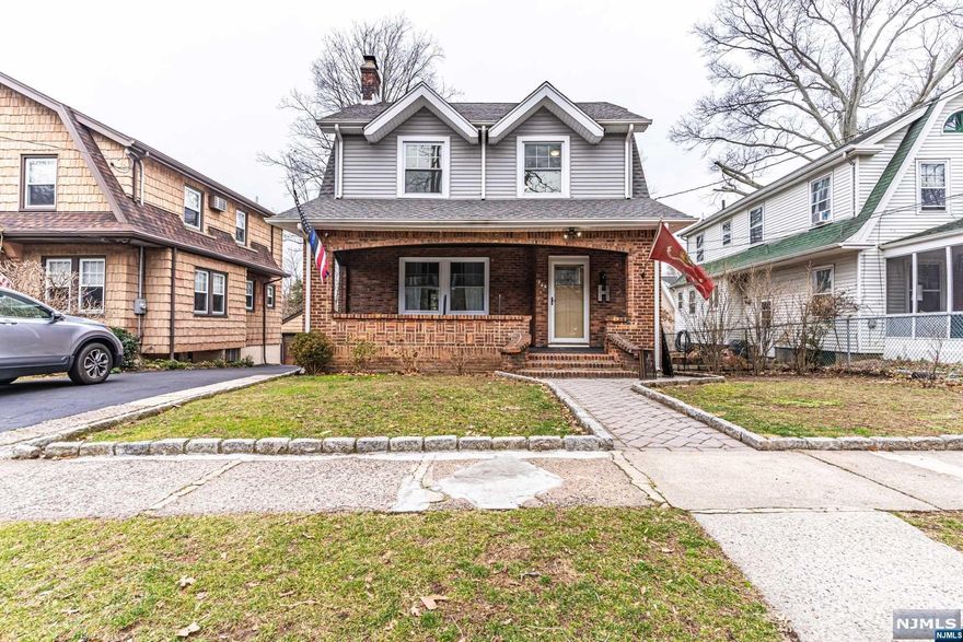 Amazing opportunity to own a beautifully updated 4 bed 2.5 bath colonial in desirable Leonia. Original charm surrounds the moment you view this home with the beautiful brick porch and exterior and continue through the front door and see the gorgeous fireplace. Picture yourself sitting in a rocking chair on your large front porch on a quiet tree-lined street. This charming home boasts an updated open floor plan kitchen with a large island overlooking the dining room. In the kitchen you will find all SS appliances including a gas stove. Finishing out the 1st floor you will find a quiet office and updated half bath. The 2nd floor features 3 large bedrooms and another updated full bath. The 3rd floor features a large bedroom with plenty of closet and storage space. The large open floor plan basement has an updated full bath offers plenty of opportunities for a rec room, TV room, or bonus space with side door access. With a garage and close proximity to NYC and mass transportation.
