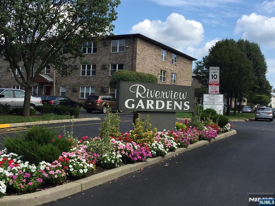 Welcome to Riverview Gardens Condominium Complex, Beautiful freshly painted unit with new flooring throughout, 2 Bedrooms, 1 and a Half Baths, Kitchen with Refrigerator, Gas Stove, Microwave and Dishwasher, plenty of cabinets. Huge Living Room, Dining Area. 2 Wall air conditioner units, Washer and Dryer in the unit, 2 car outdoor parking assigned with the unit. Complex has a No Pet Policy.