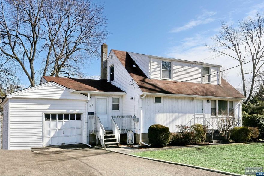 Welcome to this charming cape cod style home in the wonderful town of River Edge. Perfect for 1st time home buyers or down-sizers. Living room, MEIK, Den/Dr, Primary Bedroom, Full bath/Laundry completes the first floor. 2nd floor offers 2 more sun-filled bedrooms. There is a finished basement with full bath, playroom and office. Good size property 77 wide lot x 105 in an area with new homes being built. Convenient location steps to NYC transportation, stores and restaurants. Loads of potential. Bring your ideas to make this home your own! Fantastic opportunity to get into River Edge at a great price!