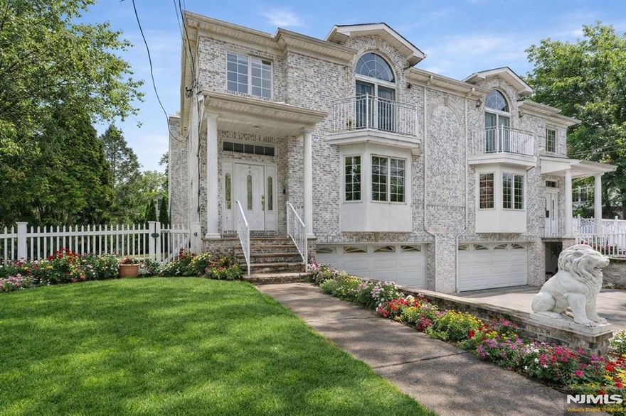 Welcome to this exceptional all-brick duplex in the highly desirable community of Waldwick, offering top-rated schools, local parks, a vibrant downtown & commuter-friendly train access to NYC. Built for timeless appeal in 2006 with over 3,000SF of living space, this beautifully-maintained home welcomes you with an expansive entry foyer & gleaming hardwood floors throughout. The formal living & dining rooms flow seamlessly into the family room with a gas fireplace, adding warmth & elegance to the thoughtfully designed layout. The modern eat-in kitchen offers ample counter space, wood cabinetry, stainless steel appliances, & sliding glass doors leading to the stone patio & backyard. The upper level offers an impressive primary suite featuring a Juliet balcony, tray ceilings, a private bath with double vanity & Jacuzzi tub, plus 3 walk-in closets. Two additional bedrooms are both spacious, with a full bath & laundry conveniently located in the hallway. The fully-finished lower level provides versatile bonus space ideal for recreation, home office, fitness & entertainment along with a full bath & direct outdoor access. Additional highlights include an oversized 2-car attached garage, Andersen windows, a paver driveway, central vacuum, newer central air conditioning & newer water heater. Enjoy townhouse-style living without HOA fees or restrictions. A rare opportunity combining quality construction, generous space & modern amenities in sought-after Bergen County.