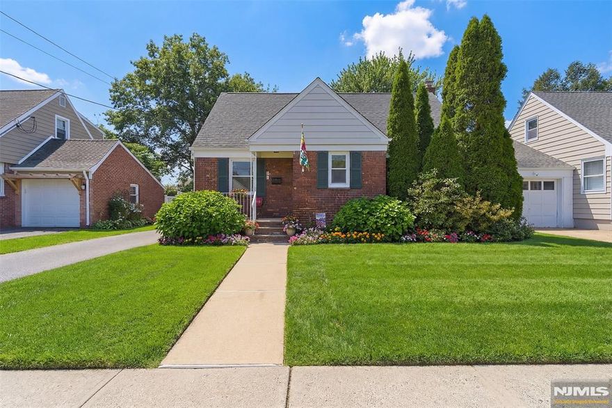 Super charming and meticulously maintained and updated Cape Cod style ranch! Located on one of Rochelle Park's loveliest streets, within close walking distance of express NYC transp, this move-in ready home offers the ideal blend of suburban charm and commuter convenience! Enjoy one floor living with endless expansion potential! Step inside from the charming front porch into a spacious and sun-filled formal LR. The newly updated eat-in kitchen boasts new Stainless steel appliances and sleek quartz countertops. The bright 3 season sunroom off of the kitchen offers the perfect place to relax and unwind with a morning cup of coffee or evening nightcap, overlooking the beautiful 150 ft deep property. Two spacious BRs and newly renovated full bth with classic finishes complete the first floor. Fully finished basement offers exceptional add'l living space with a large fam rm w/wet bar, office/guest room w/ample closets, lndry/util plus a separate walk-in closet perfect for a future pantry or to add a bath. Full walk up 2nd floor is unfinished but can easily be converted into an add'l BR, or dormered to allow for multiple addt'l BRs/Bths. Oversized flat property with room for a pool or a rear addition is ideal for entertaining, gardening or simply enjoying your own outdoor retreat. Freshly painted throughout, newly refinished HDWD flrs, Cent AC, detached one-car garage plus long driveway. Nothing to do but move-in and enjoy!*Some photos are virtually staged/enhanced/or finished.