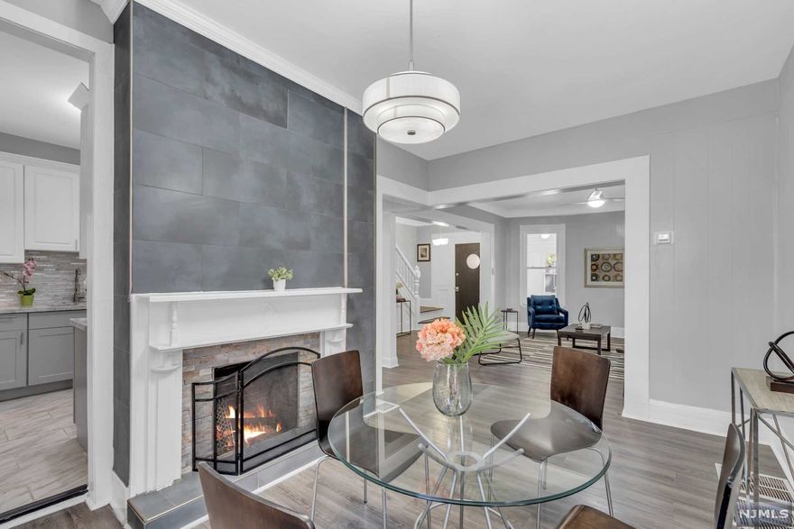 Spacious newly renovated 4 story single family colonial home with 5 bedrooms 3 full bathrooms and 2 half bathrooms. This home offers 2 master en-suite, high ceilings, new flooring throughout, new kitchen, bathrooms, HVAC central air and heat. Immaculate attention to detail in the newly renovated kitchen accompanied by mosaic tile backsplash, granite countertops, custom cabinetry and brand new stainless steel appliances. The open floor plan concept living room to the dining room offers a wood burning fireplace to add to the ambiance. The second floor offers one of the master en-suite with dual closets, lots of natural light along with 2 bedrooms and 1 full bath room. The second floor boasts additional closet space, 1 bedroom and the second master en-suite with a full bathroom. A full finished basement provides additional living space, a half bathroom and separate laundry room. Outdoor deck and fenced backyard all come with this home conveniently located 30 minutes from NYC